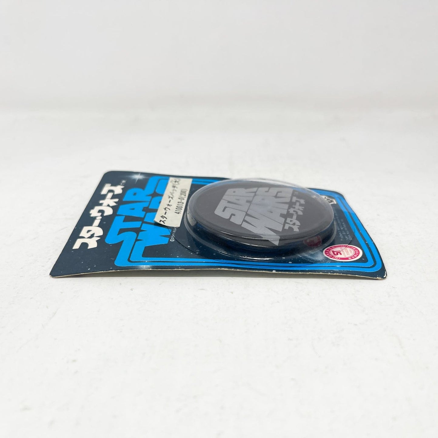 Vintage Factors Star Wars Non-Toy Takara Star Wars Logo Button - Black Mint in Package